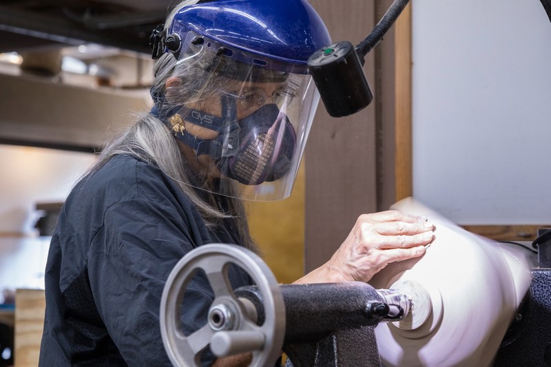 Annie Ogg turning at the lathe