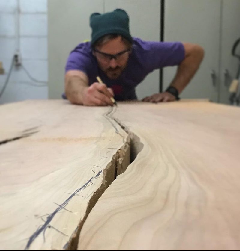 Chester Shuey working on a live edge slab