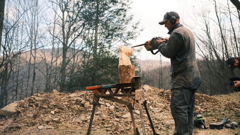 Mike Ayers chainsaw carving outdoors