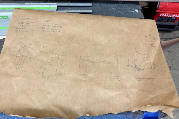 Kwadwo&rsquo;s pencil design sketch for the mantel on brown paper, with measurements and joinery details