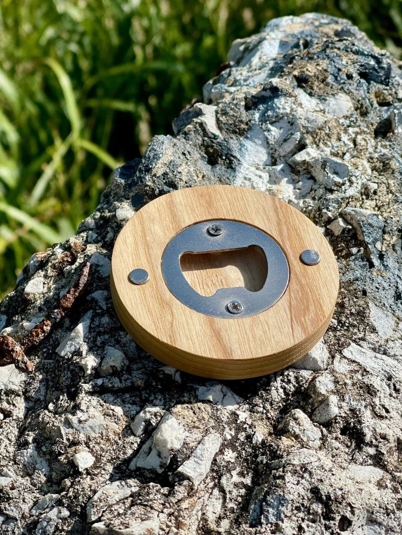 Round wooden magnetic bottle opener made from Hurricane Helene salvaged wood