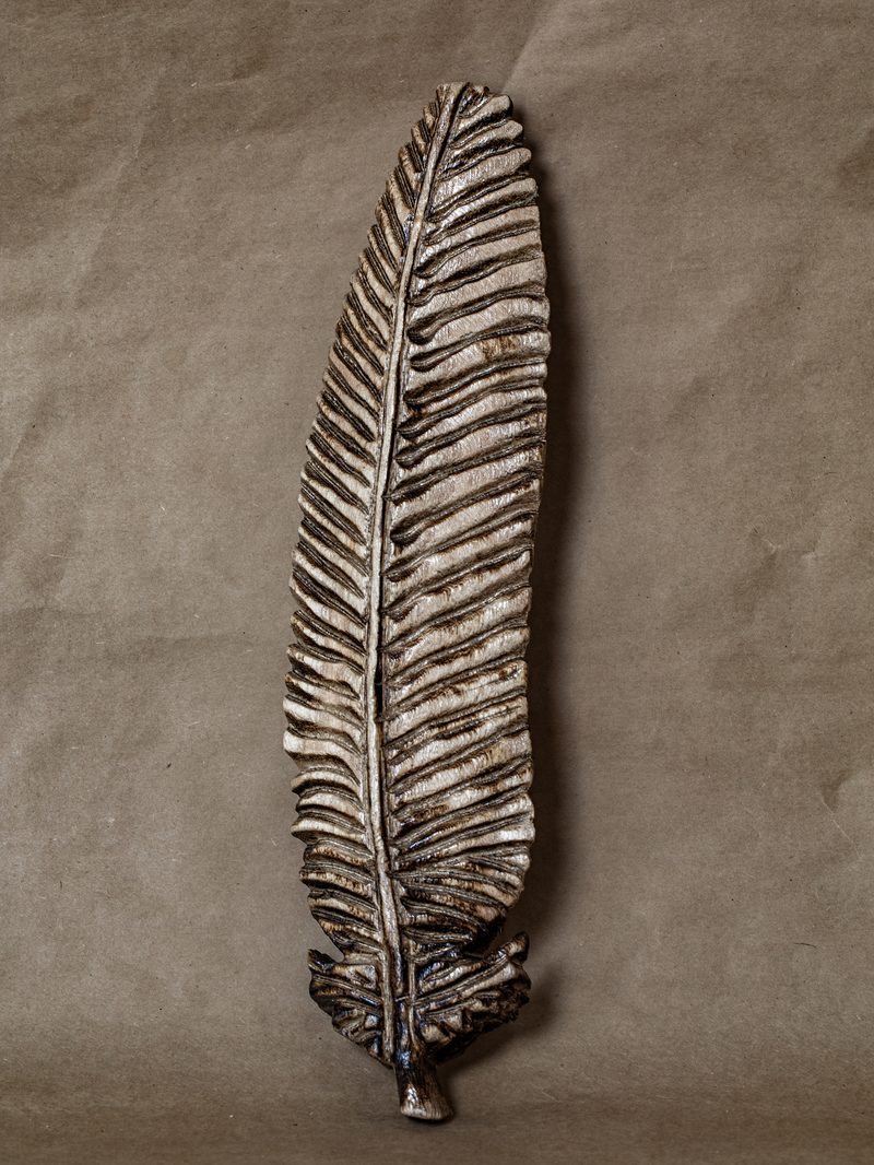 Paulownia wood feather carving by Mike Ayers
