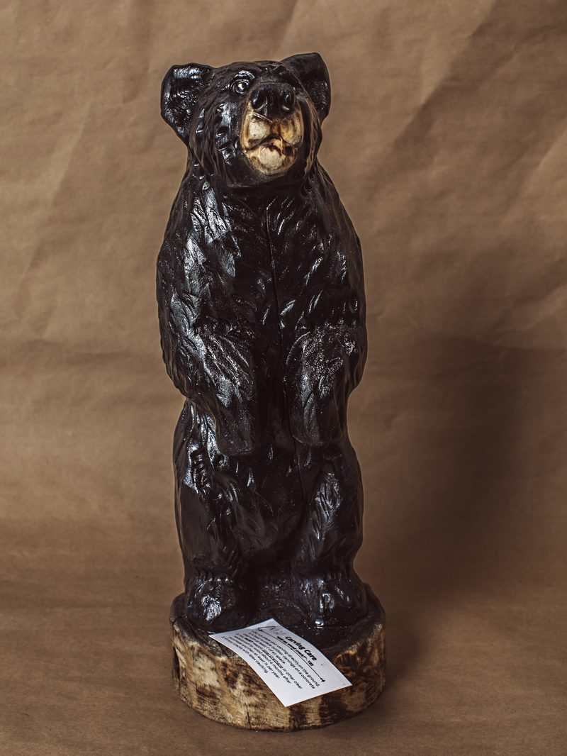 White pine standing bear sculpture by Mike Ayers