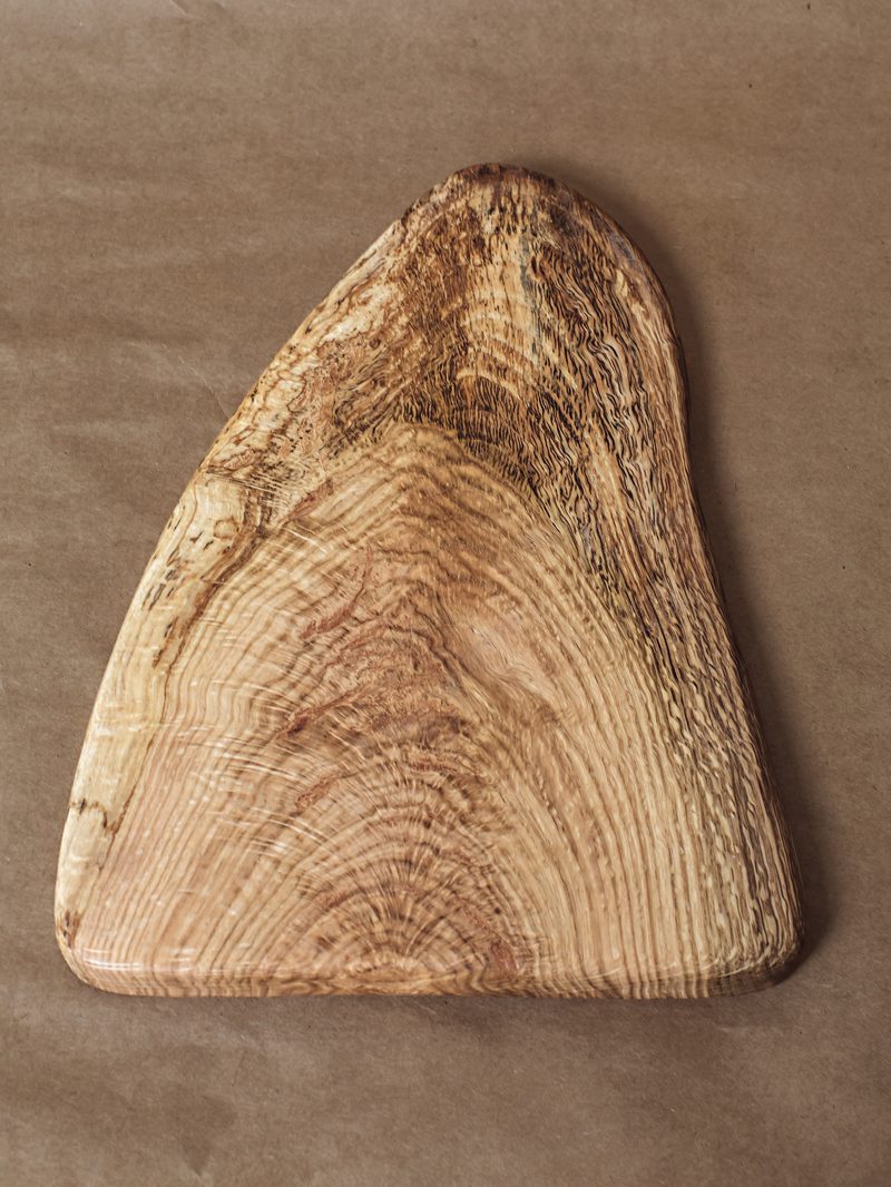 Large oak cheese board by Paul Eisenhauer, 9 by 12 and a half inches
