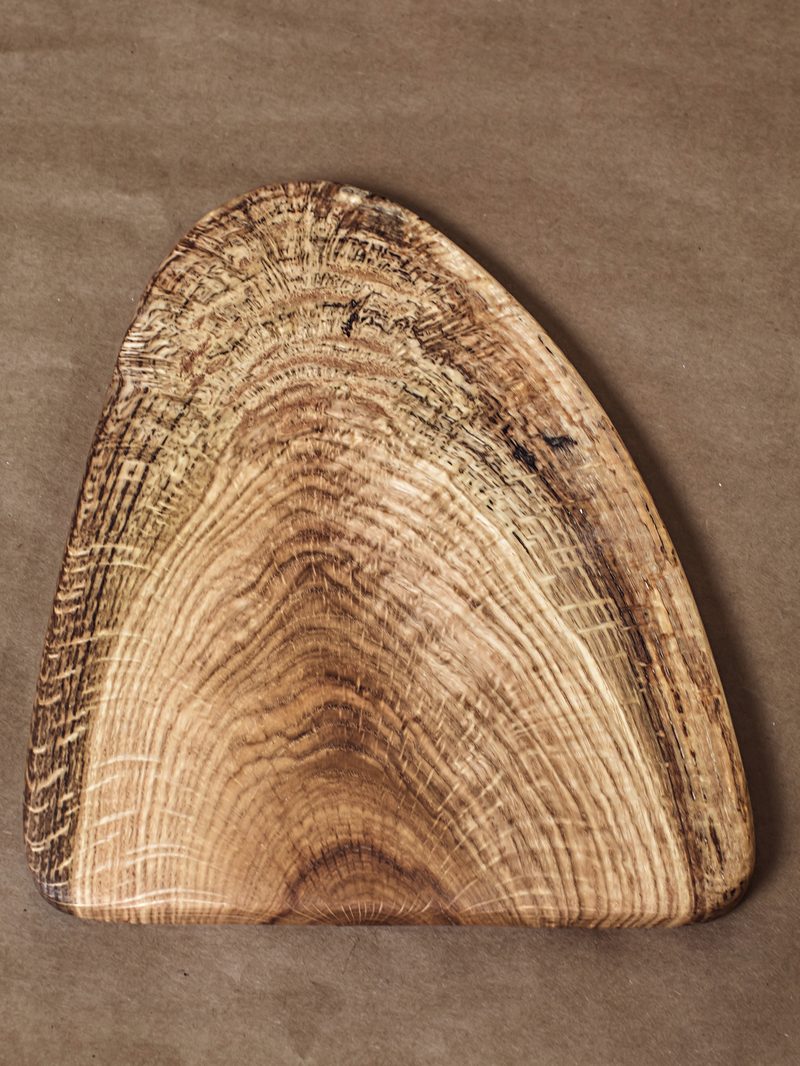 Small oak cheese board by Paul Eisenhauer, 8 and a half by 10 inches