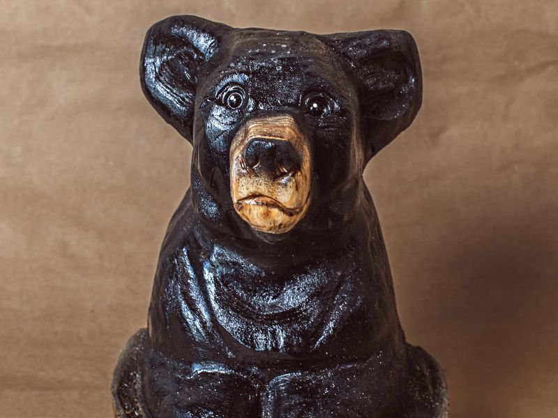 Chainsaw-carved black bear sculpture